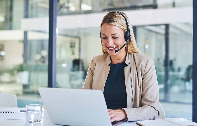 female corporate laptop headset webinar blog image    