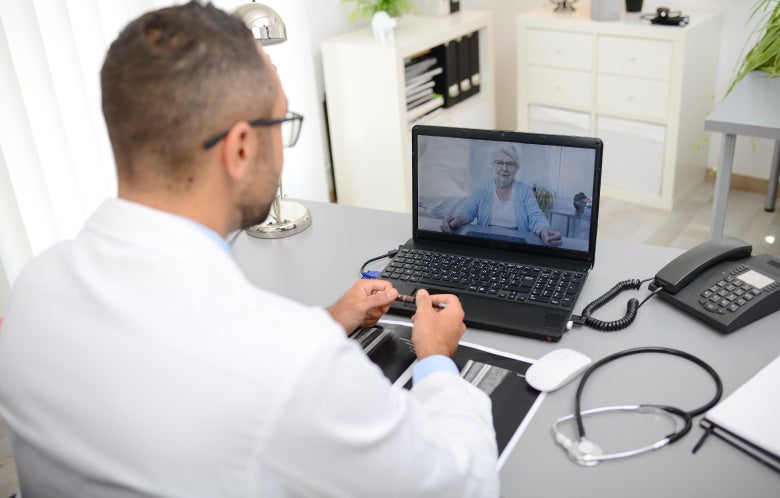 telemedicine male doctor elderly patient blog image template    