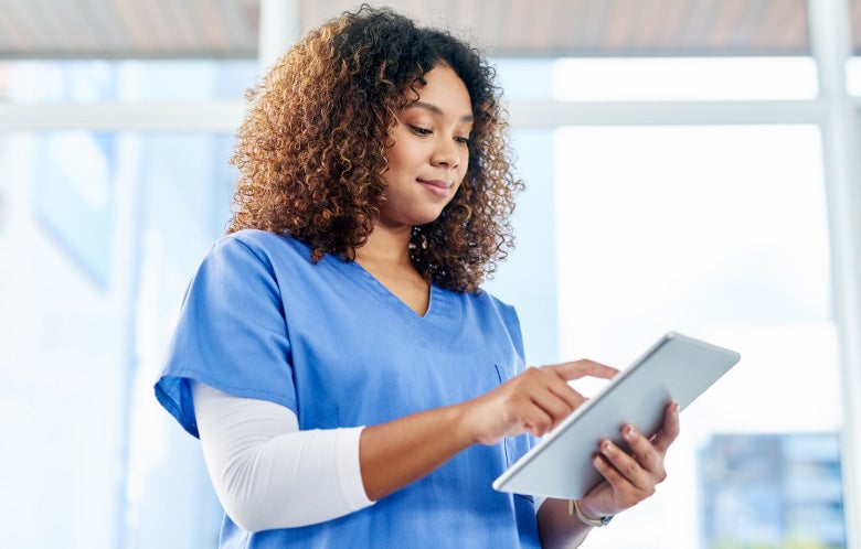 Nurse holding tablet