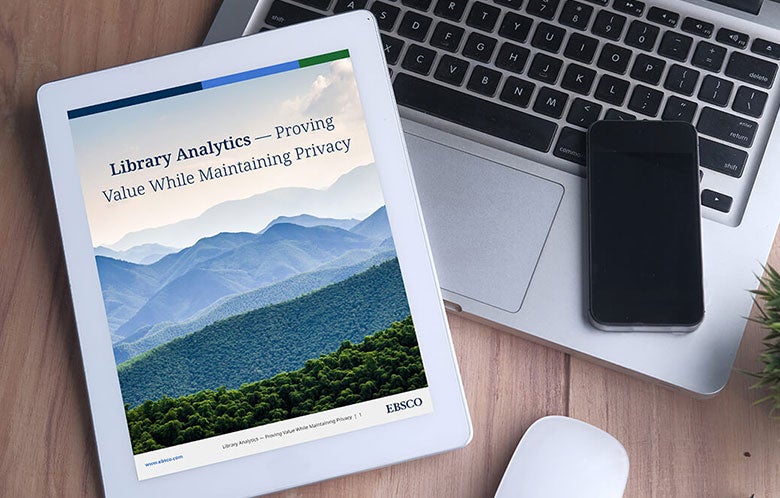 Tablet resting on a laptop with a phone. The tablet features the resource "Library Analytics – Proving Value While Maintaining Privacy."