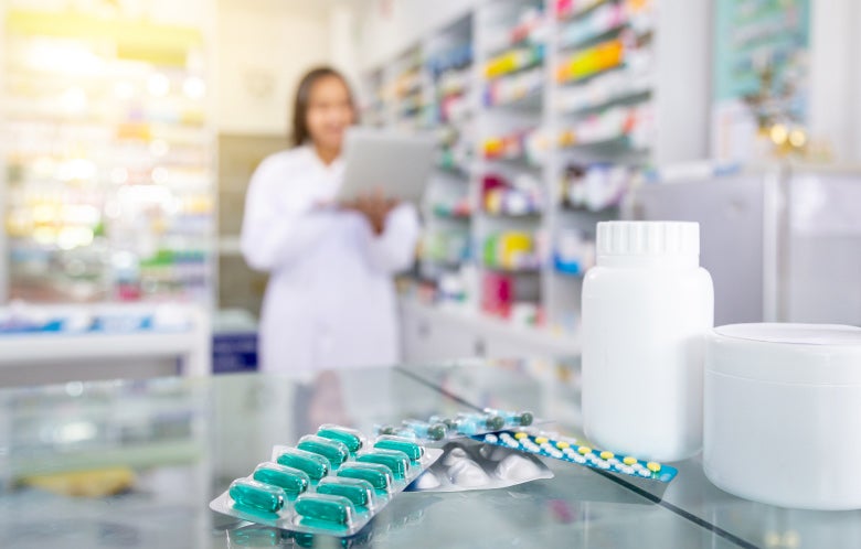 Prescribed medicine on counter in pharmacy