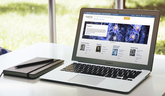 laptop with explora homepage on the screen